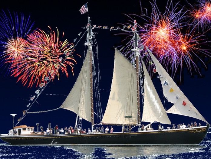 Fireworks over the ocean and boats
