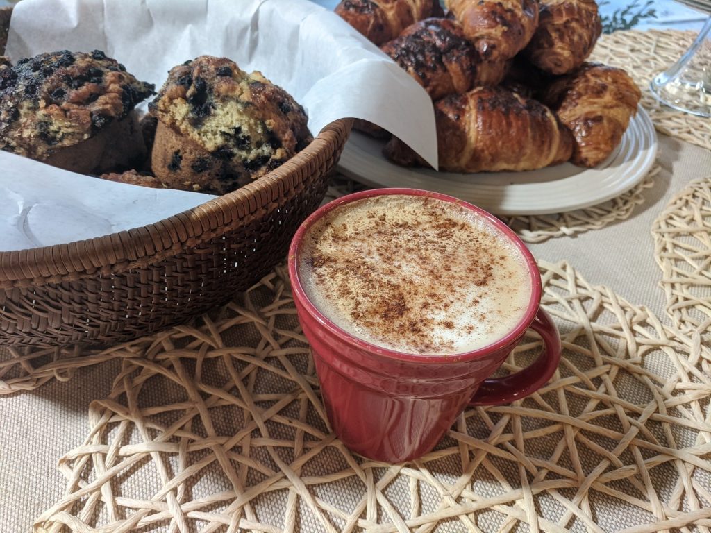 Hot latte, scones and muffins